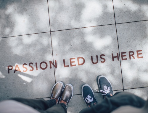 Casual shoes with passion led us here message on the floor